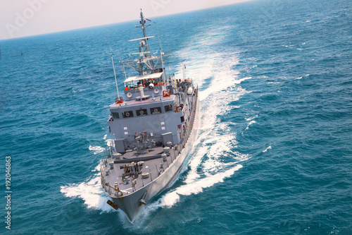 Military navy ships in a sea bay view from helicopter