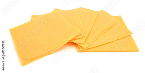 processed sliced cheese isolated on white photo