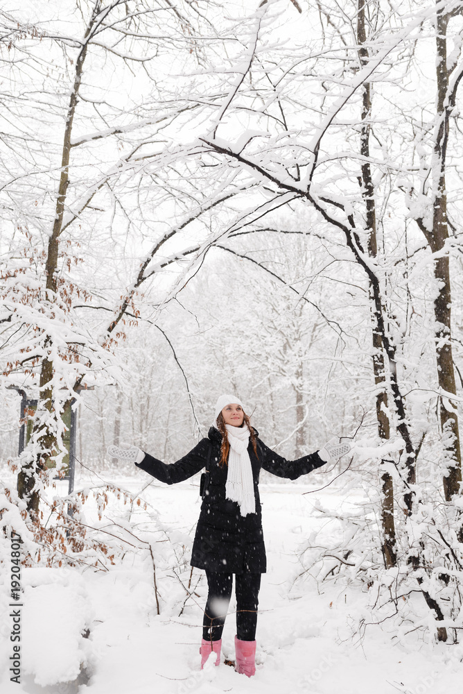 Beautiful young girl in a white winter forest Beautiful young girl in a white winter forest