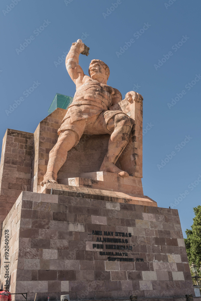 Statue of El Pipila with a clear blue sky, in the background, in Guanajuato, Mexico