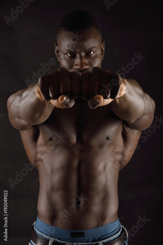 Obraz na plátně Shot of a man with his fists in front