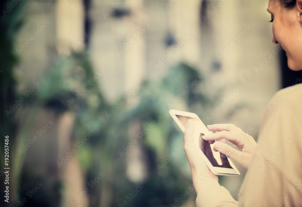 Ordinary woman looking for the map in the phone