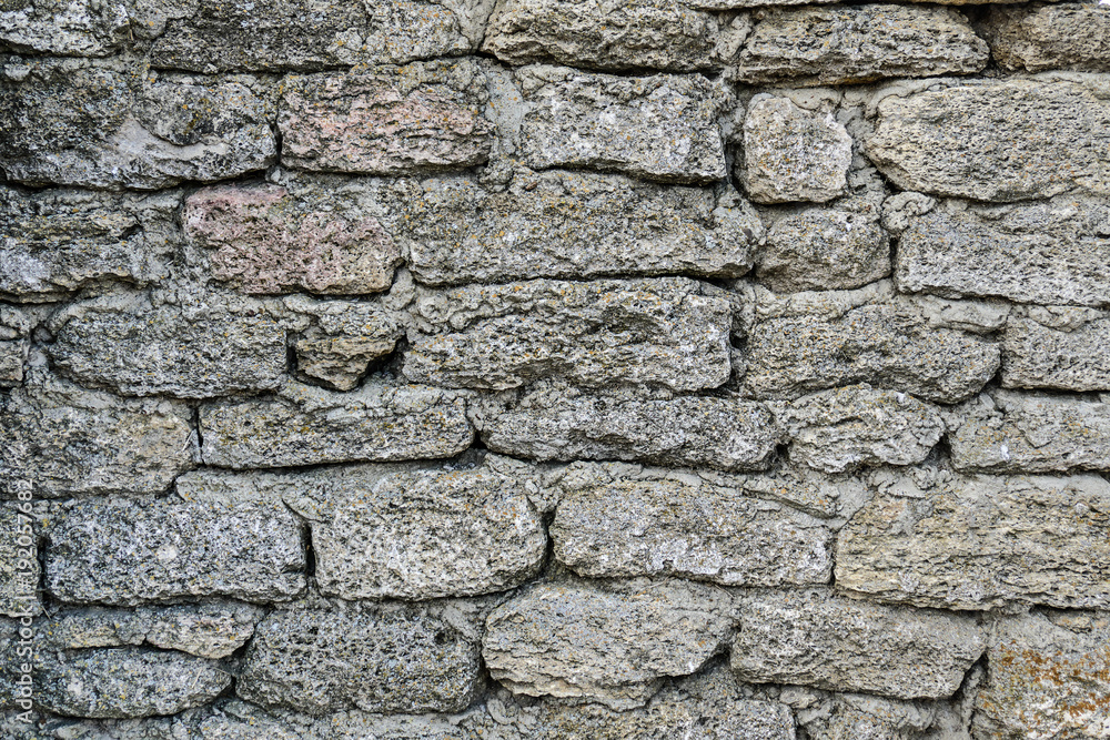 Texture of dark wall is made of natural material. Stone background. Texture of dark wall is made of natural material. Stone background.