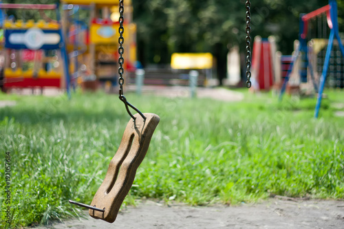 Broken chain on the children's swing, which is installed on the playground