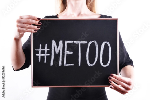 '#METOO' text in woman's hands. Female empowering movement concept.