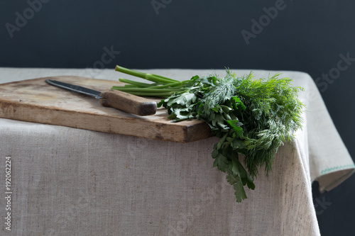 Green spices on the kitchen table