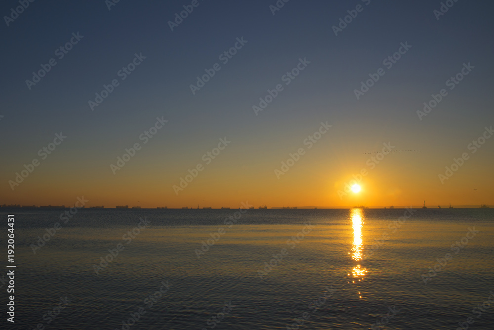Gold sunset on Black Sea of Taman Gulf