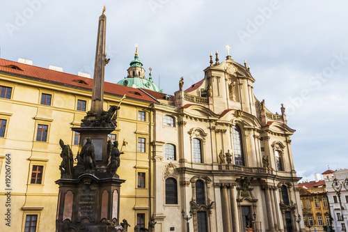 St.Nicholas Church and square front of cathedral in the quarter of Mala Strana in Prague in Central Europe, facade of Baroque architecture