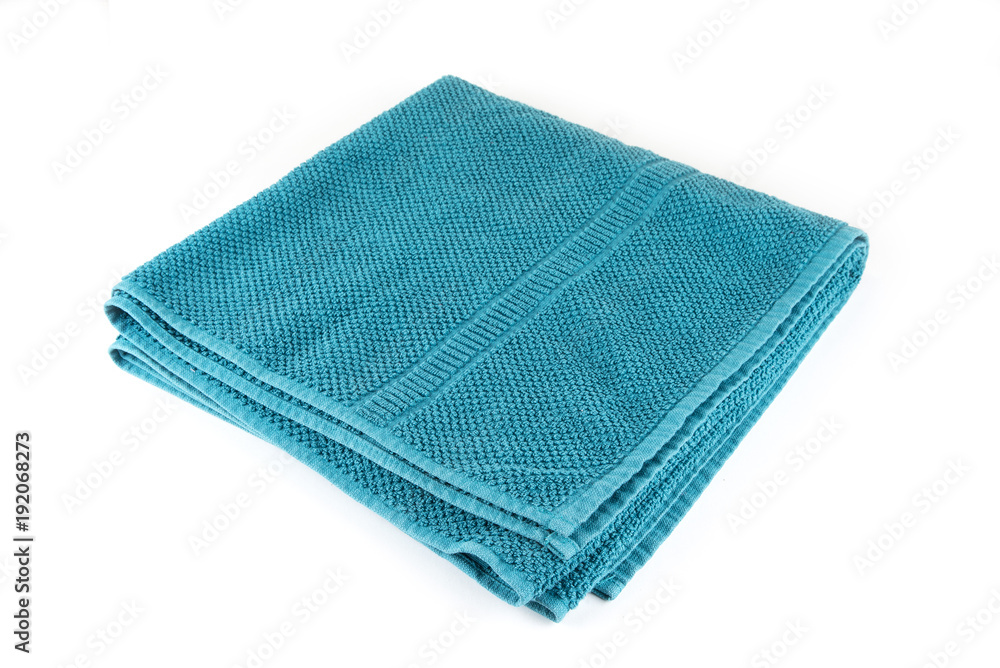 Medium towel for the bathroom and bath on the white Medium towel for the bathroom and bath on the white