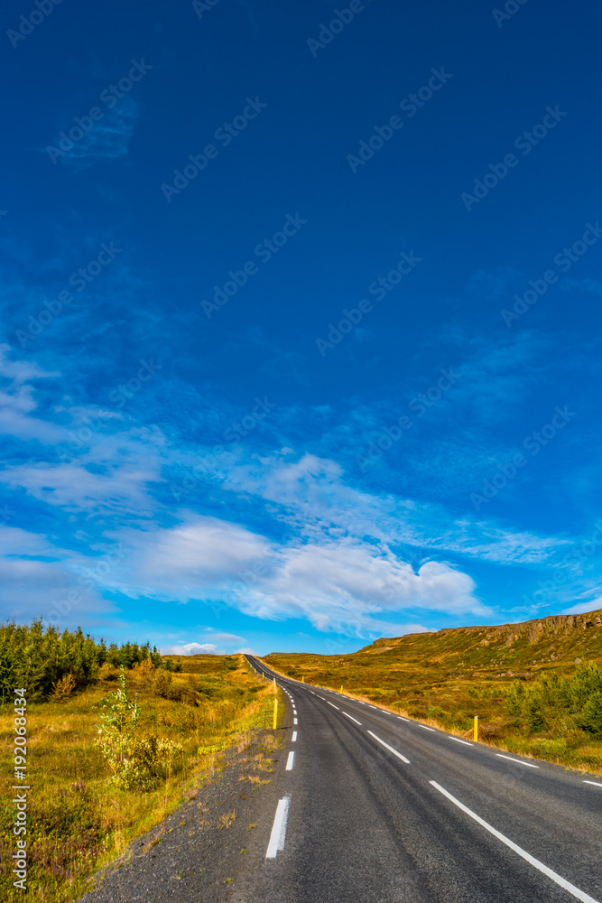 Isolated road and Icelandic colorful landscape at Iceland,