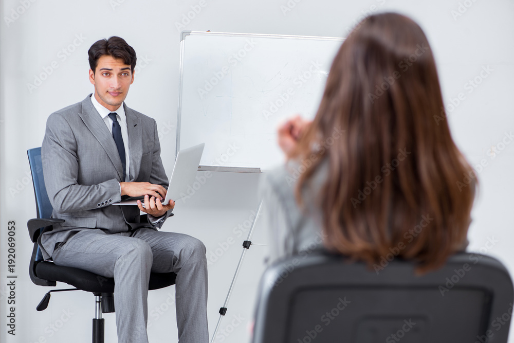 Business presentation in the office with man and woman Business presentation in the office with man and woman