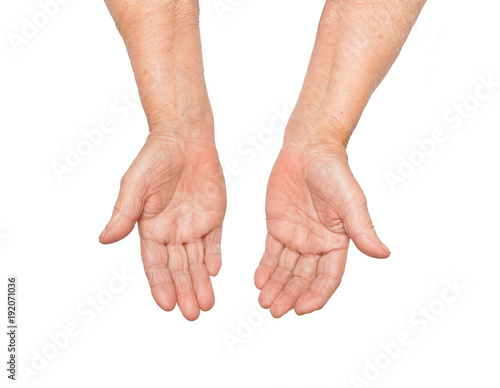 Hands of an elderly woman isolated on white background. Senior lady wrinkled hand with copyspace for your text.