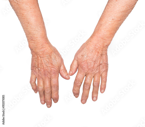 Hands of an elderly woman isolated on white background. Senior lady wrinkled hand with copyspace for your text.