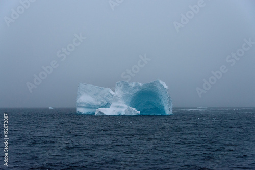 Iceberg in Antarctic sea © Alexey Seafarer