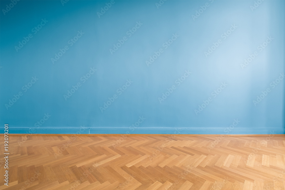 blue wall  in empty room with parquet floor - obrazy, fototapety, plakaty 