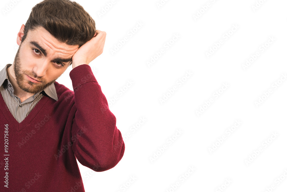 The sad man hold a head on the white background The sad man hold a head on the white background