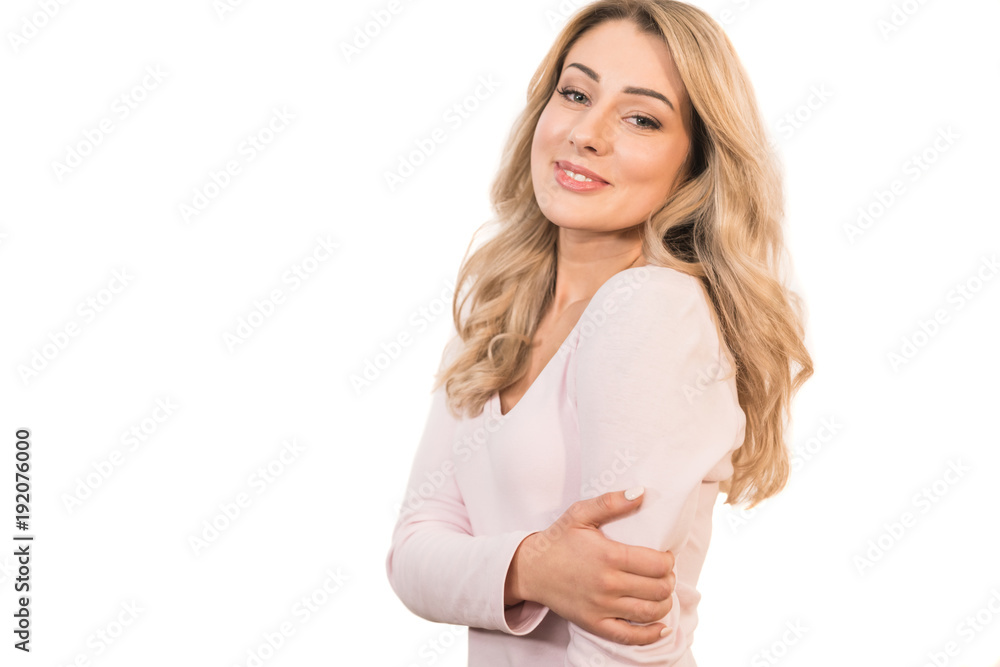 The attractive woman posing on the white background The attractive woman posing on the white background