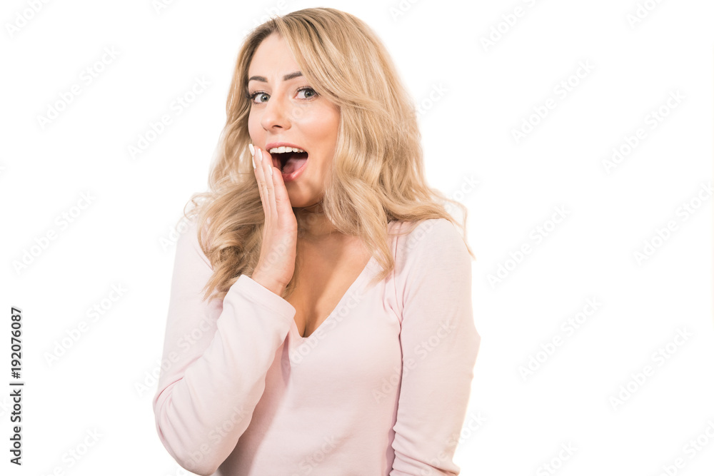 The excited woman gesturing on the white background The excited woman gesturing on the white background