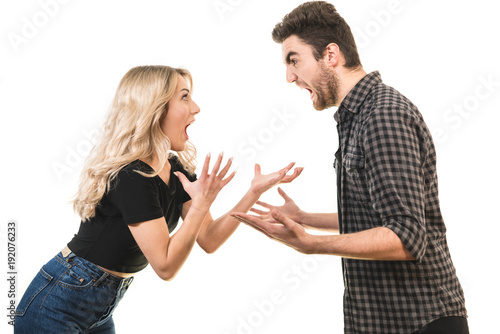 The man and woman screaming on the white background