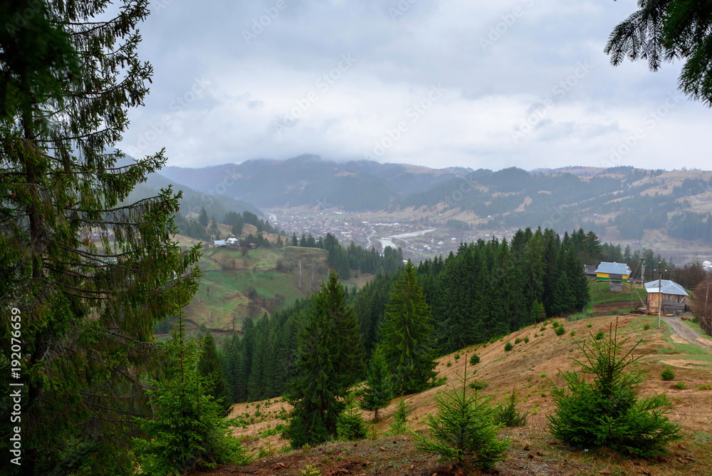 Fototapeta premium mountain countryside small houses in the village beautiful nature and vegetation