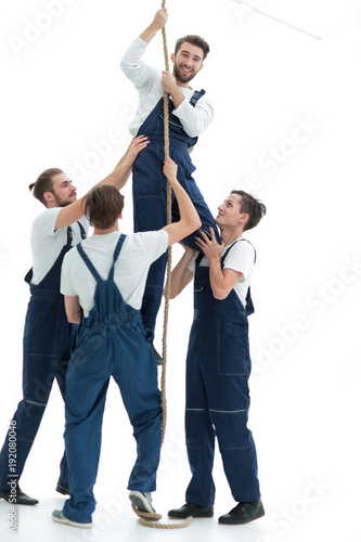 group workers help the companion to climb up