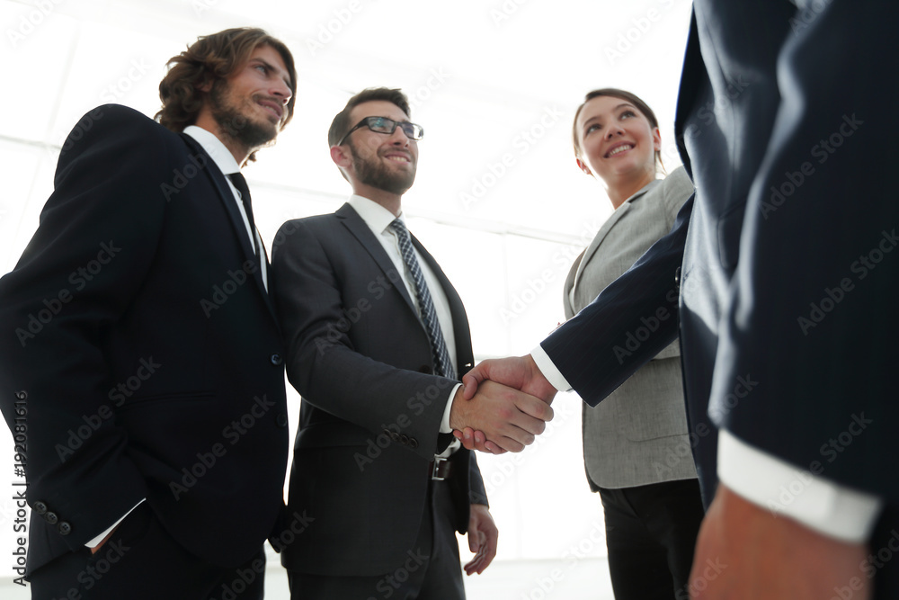 business people handshaking after good deal. business people handshaking after good deal.