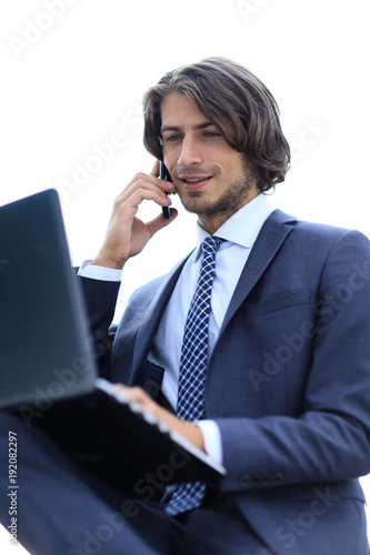 closeup.serious businesswoman talking on the smartphone