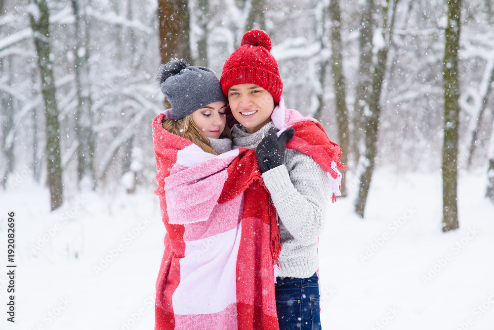 Hugs of beautiful couple in plaid Hugs of beautiful couple in plaid