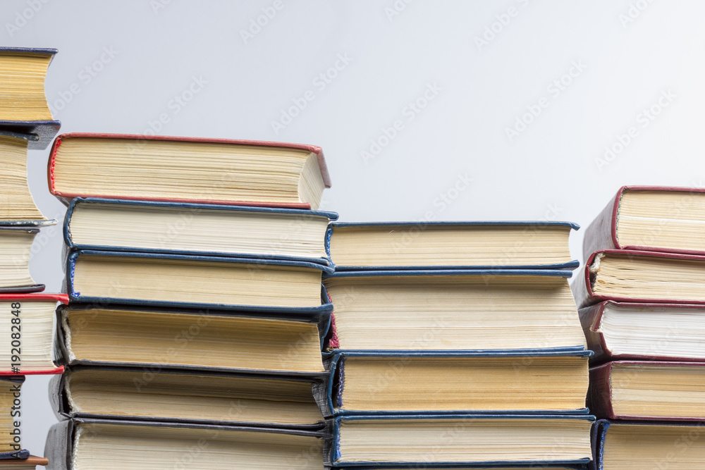 Stack of books background. many books piles. Stack of books background. many books piles.