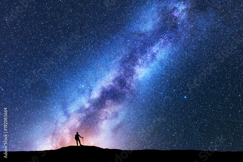 Silhouette of man with trek...