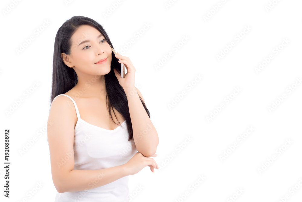Beautiful of portrait asian young woman smile and happy talking calling with mobile phone isolated on white background. Beautiful of portrait asian young woman smile and happy talking calling with mobile phone isolated on white background.