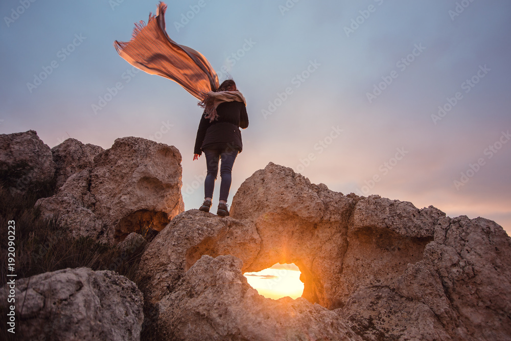 woman with scarf in the wind