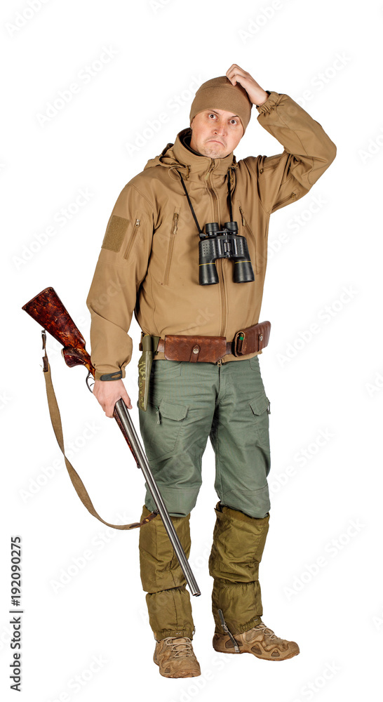 Full length portrait of a male hunter with double barreled shotgun Isolated on white background. hunting and people concept. Full length portrait of a male hunter with double barreled shotgun Isolated on white background. hunting and people concept.