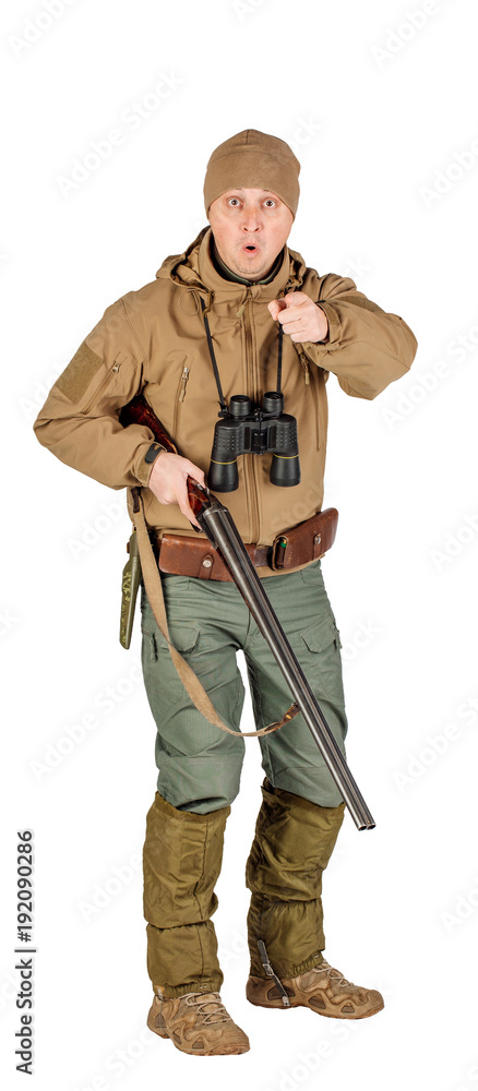Full length portrait of a male hunter with double barreled shotgun Isolated on white background. hunting and people concept. Full length portrait of a male hunter with double barreled shotgun Isolated on white background. hunting and people concept.