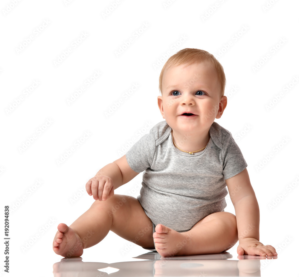 Infant child baby boy toddler sitting naked in grey body Infant child baby boy toddler sitting naked in grey body