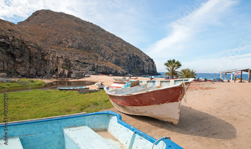 Small fishing boat   ponga at Punta Lobos beach on the coast of Baja California Mexico BCS