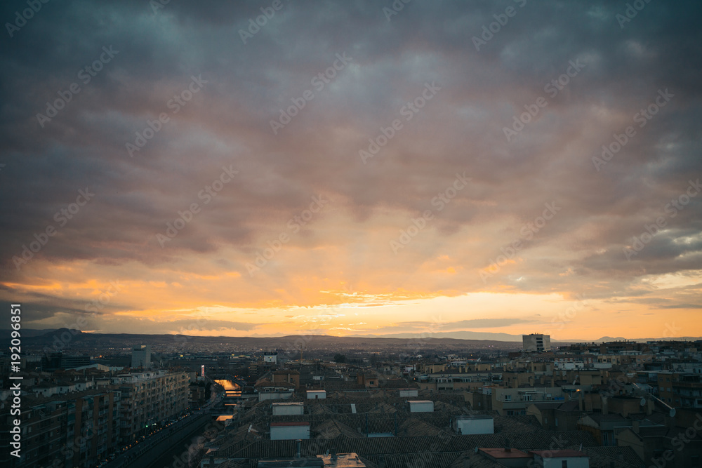 Fototapeta premium Sunset in a city. Horizon with sunset. Skyline
