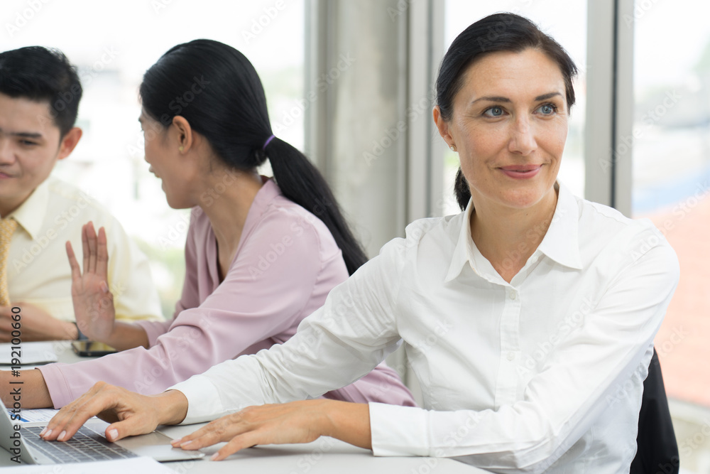 Modern business old woman in the office with copy space. Modern business old woman in the office with copy space.