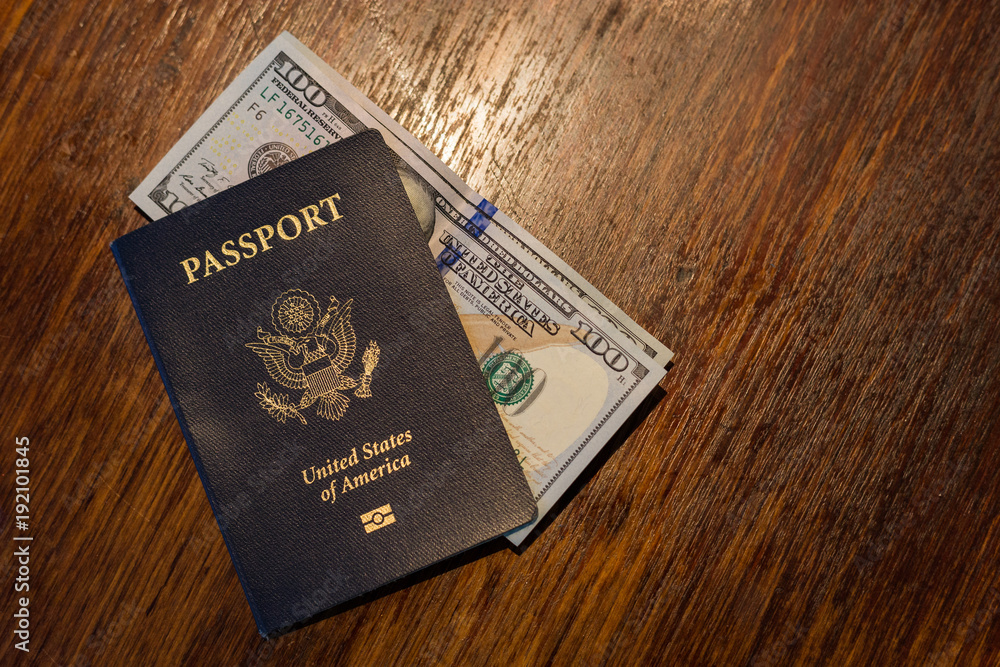 American passport and money on a table