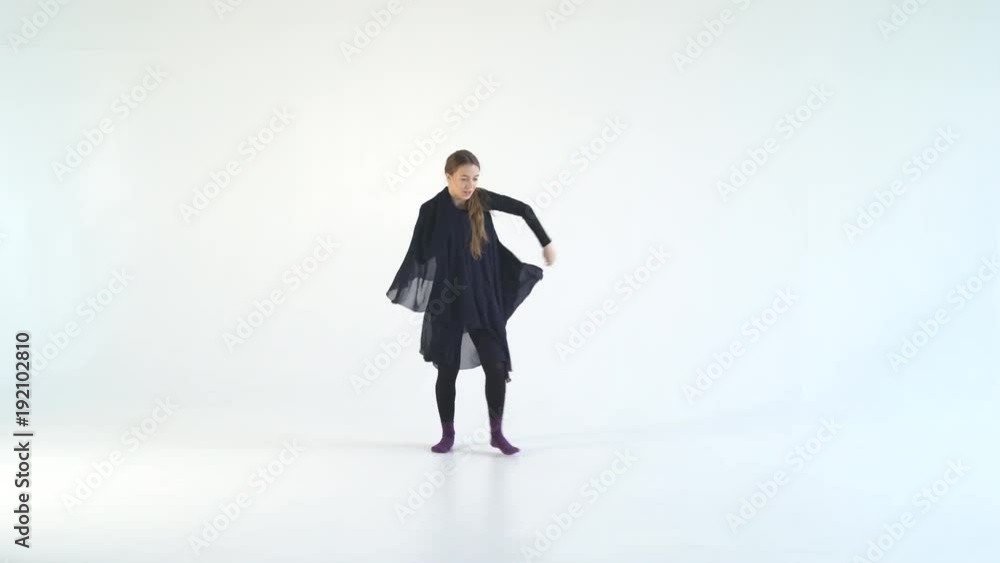 young woman dancer dancing on white isolated background. White background, black clothes. contrast video. Contemporary choreography in Contemporary style 4k young woman dancer dancing on white isolated background. White background, black clothes. contrast video. Contemporary choreography in Contemporary style 4k