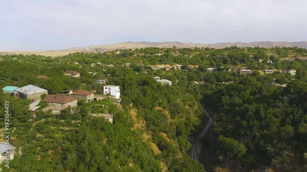 Aerial view of small village, monitoring ecology situation in mountainous area Aerial view of small village, monitoring ecology situation in mountainous area