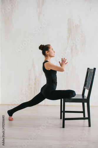 Fototapeta Naklejka Na Ścianę i Meble -  Young beautiful woman practicing yoga and gymnastic. Wellness concept. Classes in single sports.