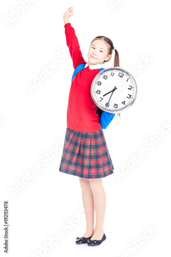 Portrait of Asian girl in school uniform holding clock on white background
