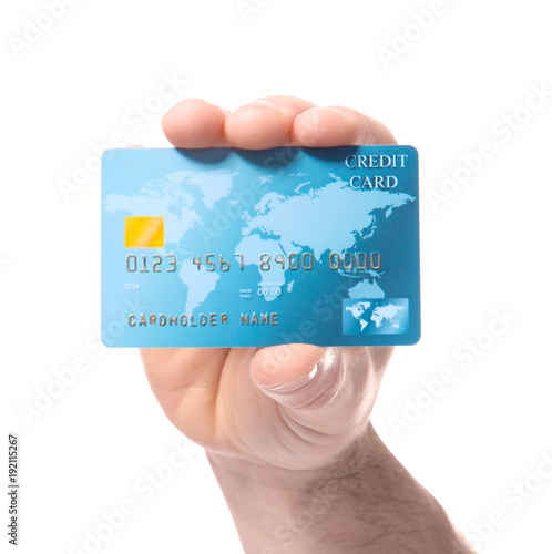 Man holding credit card on ...