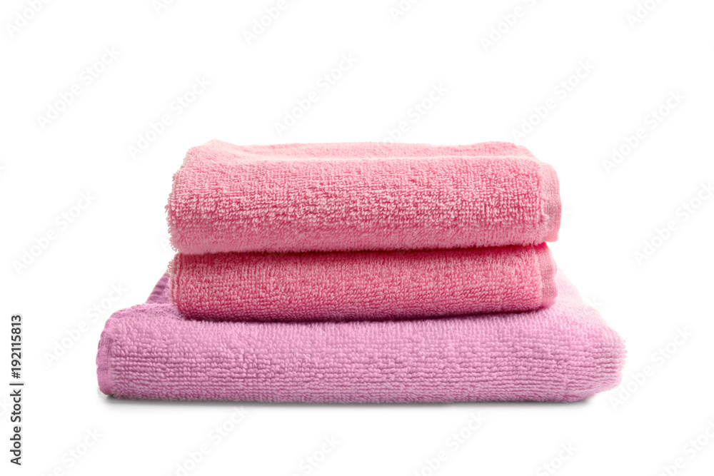Folded clean terry towels on white background Folded clean terry towels on white background