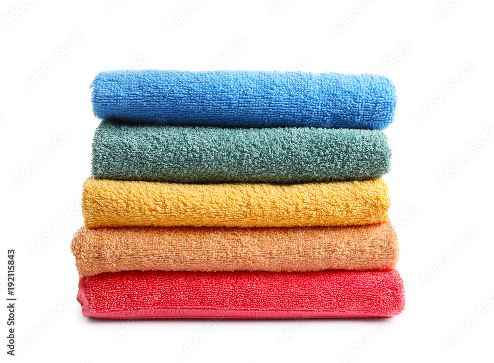 Folded clean terry towels on white background Folded clean terry towels on white background