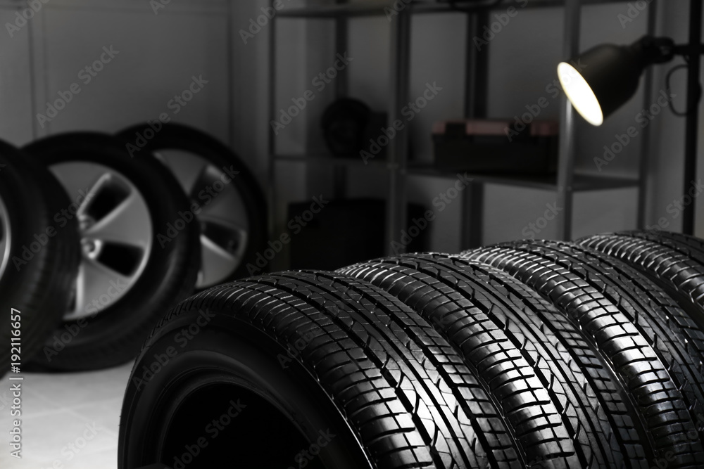 Car tires in automobile service center Car tires in automobile service center