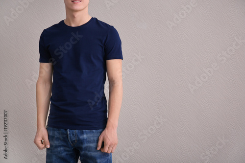 Young man in color t-shirt ...