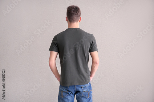 Young man in color t-shirt ...