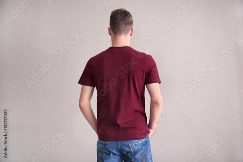Young man in color t-shirt ...